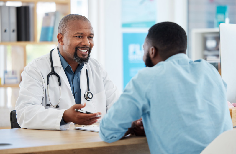 Trusted doctor-patient consultation in a concierge men’s health clinic.